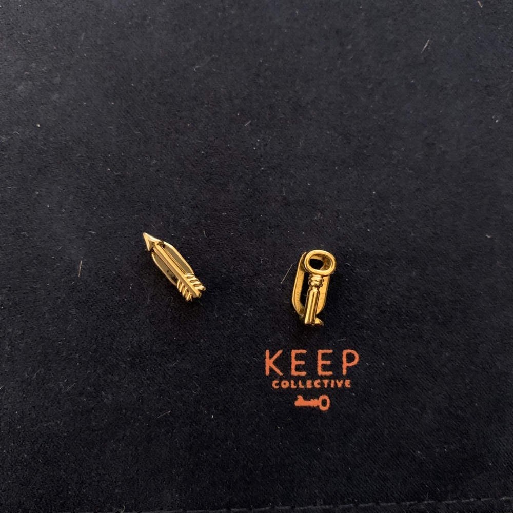 KEEP Collective arrow and key charms in gold